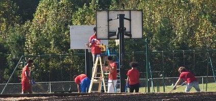 Boys Basketball works on the MES playground