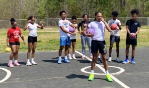 CHS Basketball students visited MES to celebrate the updated basketball court.