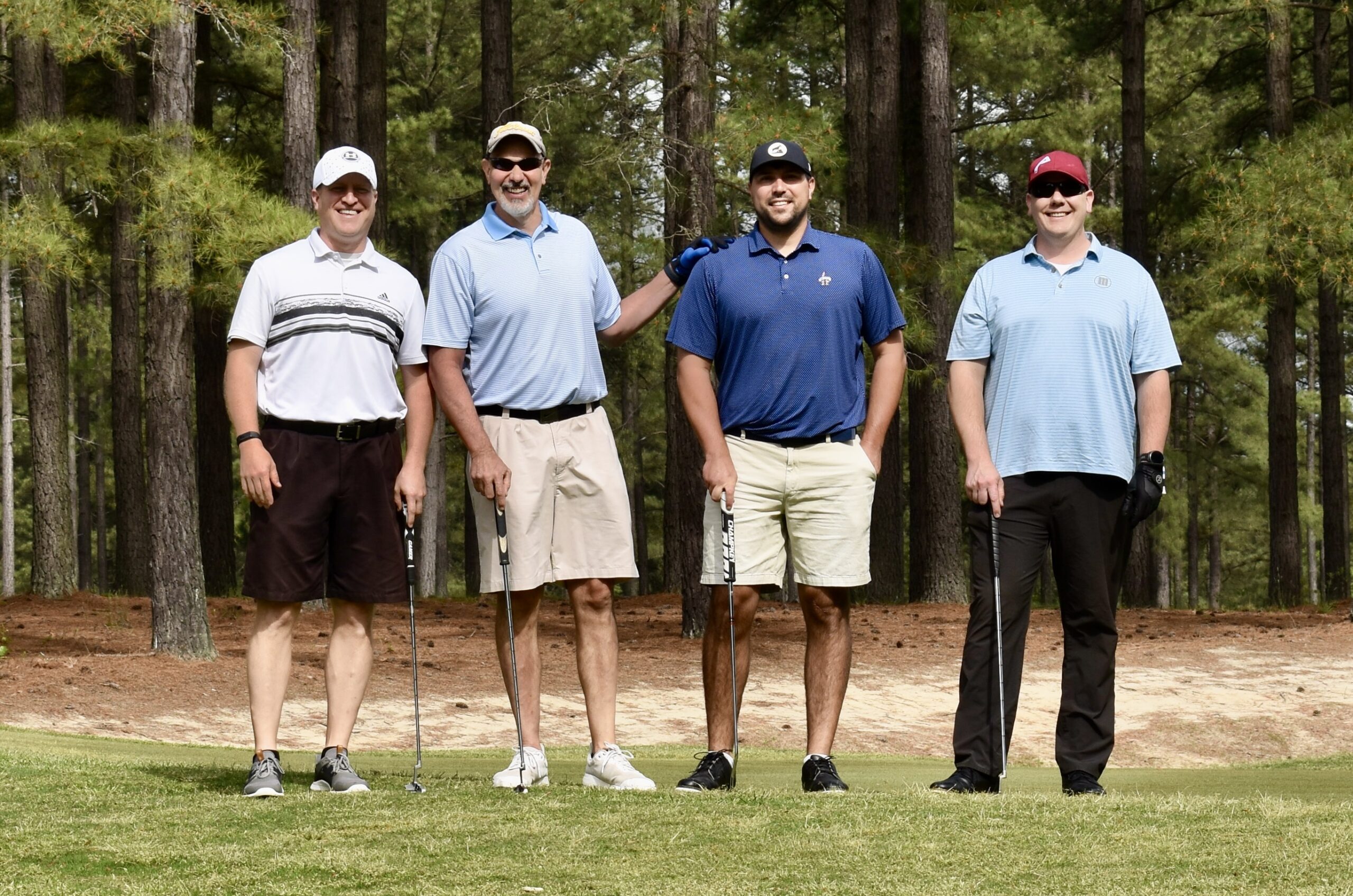 Golfers on the green at the CEF Golf tournament